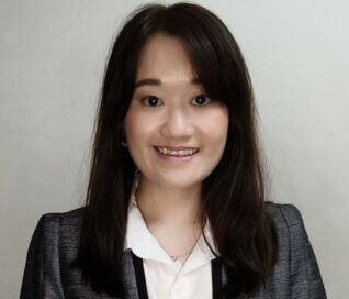 A portrait image of ACAP Education employee Katherine Karmelita